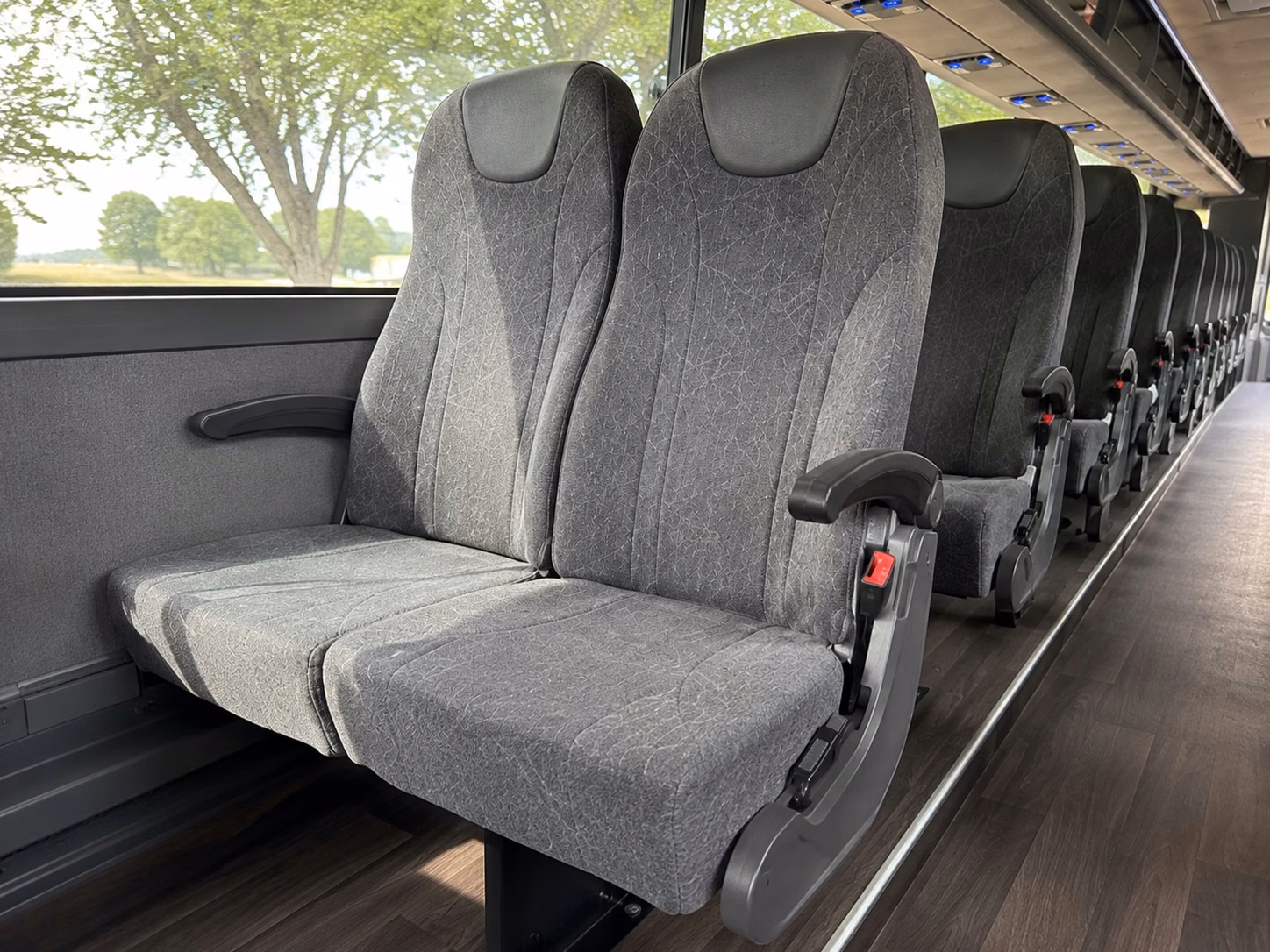 how the time of year and peak seasons affect charter bus prices in warren michigan